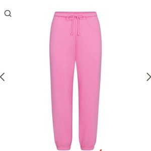 SKIMS bubblegum pink cotton fleece jogger NWT and original packaging.